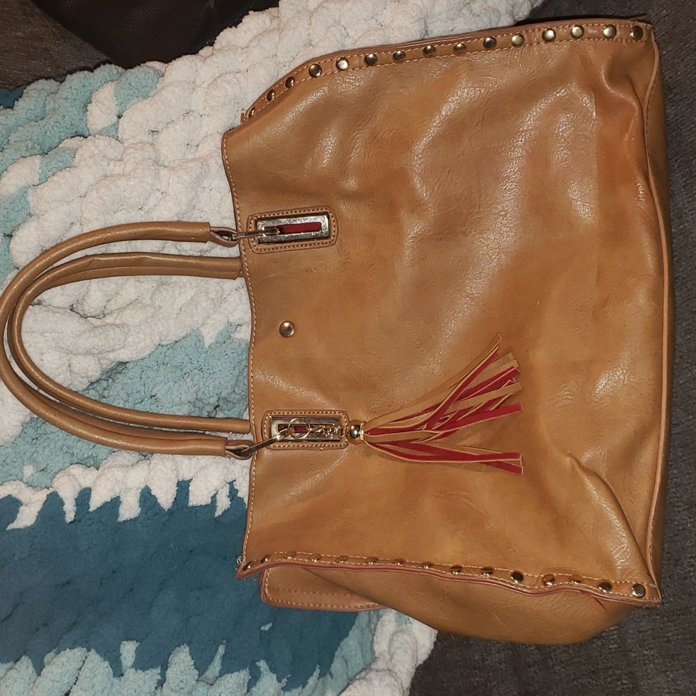 Brown leather-ish w/red velvety interior women's handbag